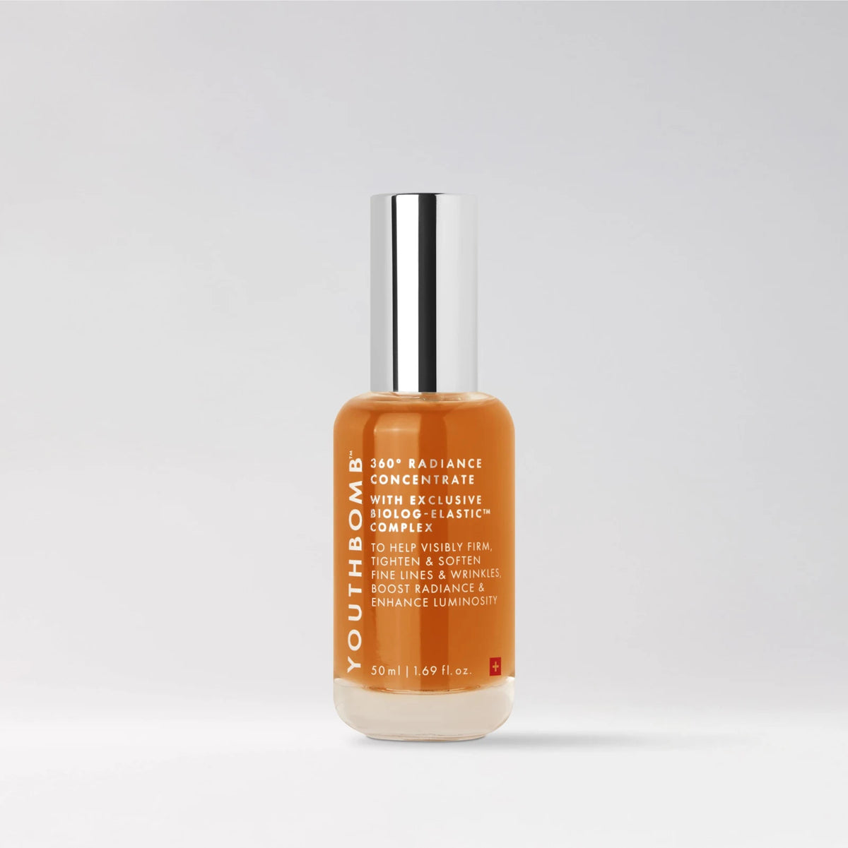 Orange bottle with silver cap on a white background
